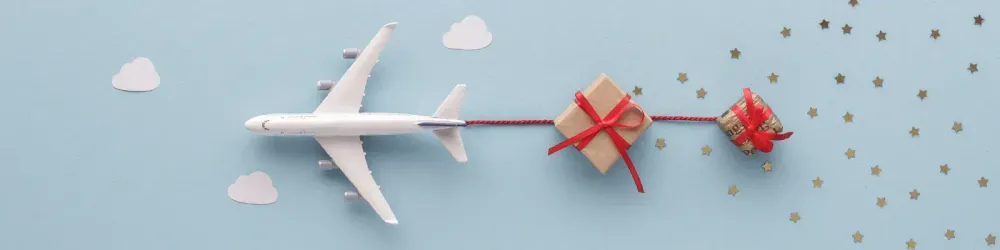 Airplane flying in sky star gift clouds top view background